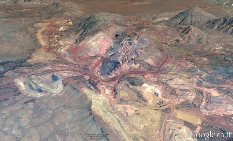 Oblique view of an open pit mine in banded iron formation at Mount Tom Price, Hamersley region Western Australia (Credit Google earth)
