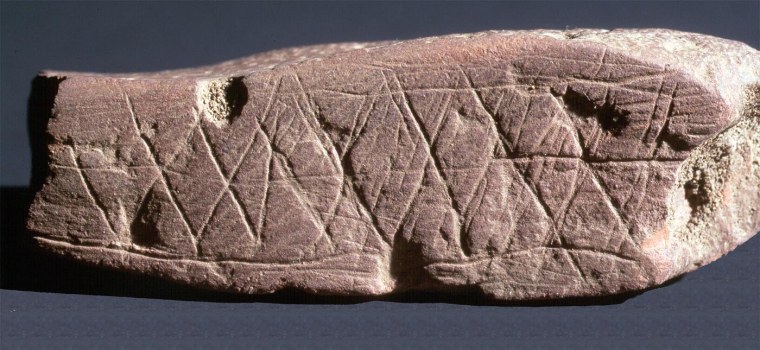 Engraved ochre from Blombos Cave, South Africa. (credit Chris Henshilwood)