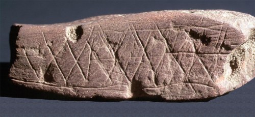 Engraved ochre from Blombos Cave, South Africa. (credit Chris Henshilwood)